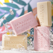 L’Occitane au Brésil Vivre Perfumed Soap Bar Set 4 Units (75g each) styled in a bright Brazilian-inspired shower – Buy now at MKPBR.COM – Worldwide Shipping