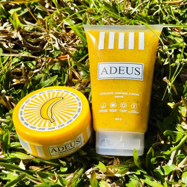 Adeus Skin Brightening Duo Kit – Banana Exfoliator & Dark Spot Cream. Both products from the kit beautifully displayed in a lush natural setting – Buy now at MKPBR.COM – Worldwide Shipping