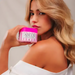 Adeus Skin Renewal & Firming Duo Kit – Pitaya Exfoliator & Cellulite Cream. Woman with radiant skin holding the Adeus Cellulite and Stretch Mark Cream – Buy now at MKPBR.COM – Worldwide Shipping