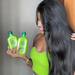 Model holding Gold Spell Co Aloe & Olive Oil Shampoo and Conditioner set for luminous, soft hair - Buy now at mkpbr.com - Worldwide Shipping