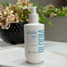 Bloom Body Bloom Body Cream Deodorant Moisturizing Body Cream Pistachio & Vanilla, Intense Hydration + Silky Feel – 7.05 oz (200 g) on a vanity for a modern body care ritual – Buy now at MKPBR.COM – Worldwide Shipping