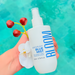 Bloom Body Blue Mist Body Splash Body Mist Cologne Spray, Fresh Aquatic Floral Scent (Moderate) – 6.76 fl oz (200 ml) lifestyle image with clean, modern beauty styling – Buy now at MKPBR.COM – Worldwide Shipping