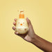 Hands spreading O Boticario Boti Baby hypoallergenic baby lotion during a gentle baby skincare routine – Buy now at MKPBR.COM – Worldwide Shipping