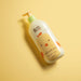 O Boticário Boti Baby Gentle Baby Conditioner 400ml styled in a bright bathroom setting as part of a baby bath care routine – Buy now at MKPBR.COM – Worldwide Shipping