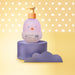 Boticário Boti Baby Lua Baby Lotion 200 ml styled on a lilac podium with paper clouds, evoking the Brazilian bedtime care ritual – Buy now at MKPBR.COM – Worldwide Shipping