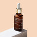 Boticário Botik Glycolic Acid 8% Brazilian face serum 30 ml bottle displayed at an angle on a pedestal against a beige backdrop – Buy now at MKPBR.COM – Worldwide Shipping