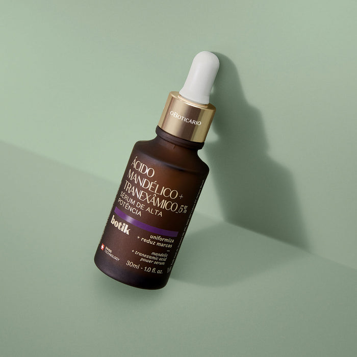 Boticário Botik Mandelic + Tranexamic Acid 5% high-potency facial serum 30 ml glass dropper bottle styled on a sage green surface in soft daylight – Buy now at MKPBR.COM – Worldwide Shipping
