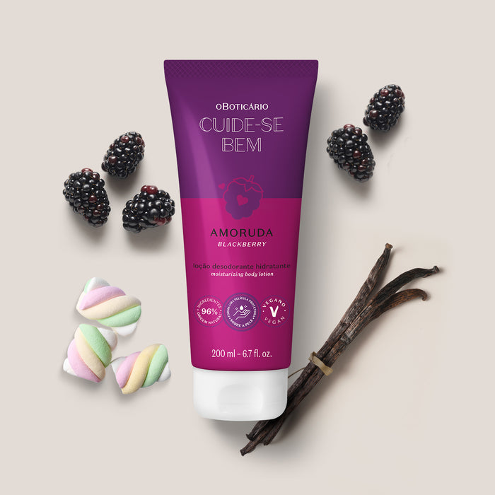 Cuide-se Bem Amoruda 200 ml body lotion tube styled with blackberries, vanilla pods and marshmallows on a beige flat lay – Buy now at MKPBR.COM – Worldwide Shipping