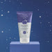 Cuide-se Bem Boa Noite exfoliating liquid soap tube displayed on a lilac pedestal against a starry navy backdrop – Buy now at MKPBR.COM – Worldwide Shipping