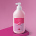 Angled view of Boticário Cuide-se Bem Cereja Livre body lotion 400 ml showing the pump dispenser and cherry label detail – Buy now at MKPBR.COM – Worldwide Shipping