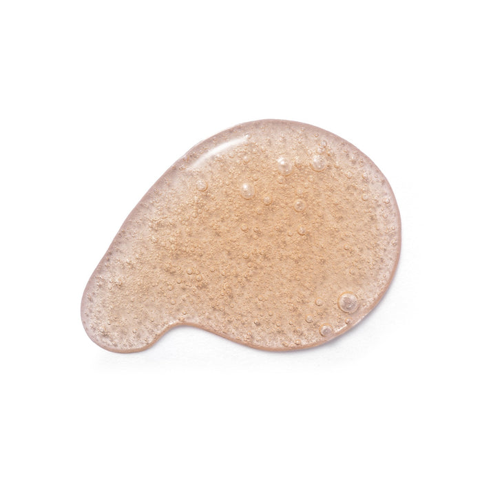 Swatch of the amber caramel coloured gel texture of Boticário Cuide-se Bem Deleite Caramelizado Body Wash on a white surface – Buy now at MKPBR.COM – Worldwide Shipping