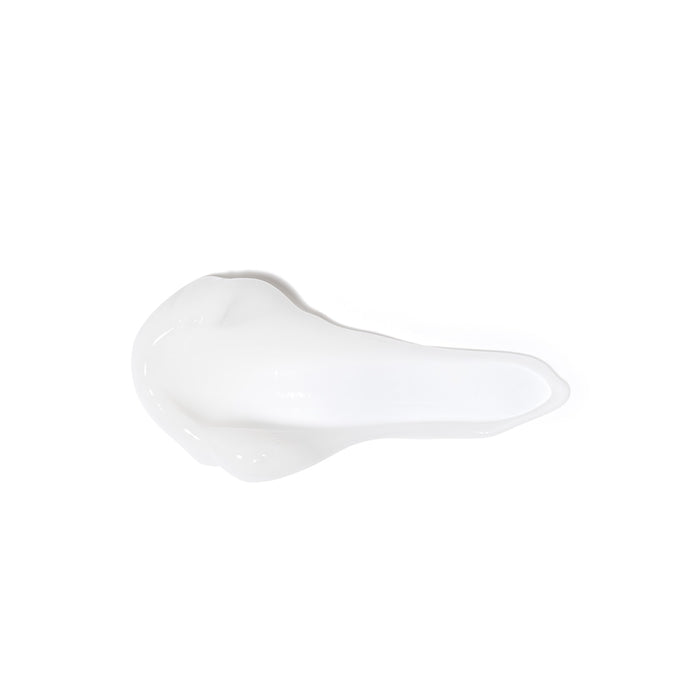 Creamy white texture swatch of Boticário Cuide-se Bem Doçura na Pessegura moisturizing body lotion on a white background – Buy now at MKPBR.COM – Worldwide Shipping