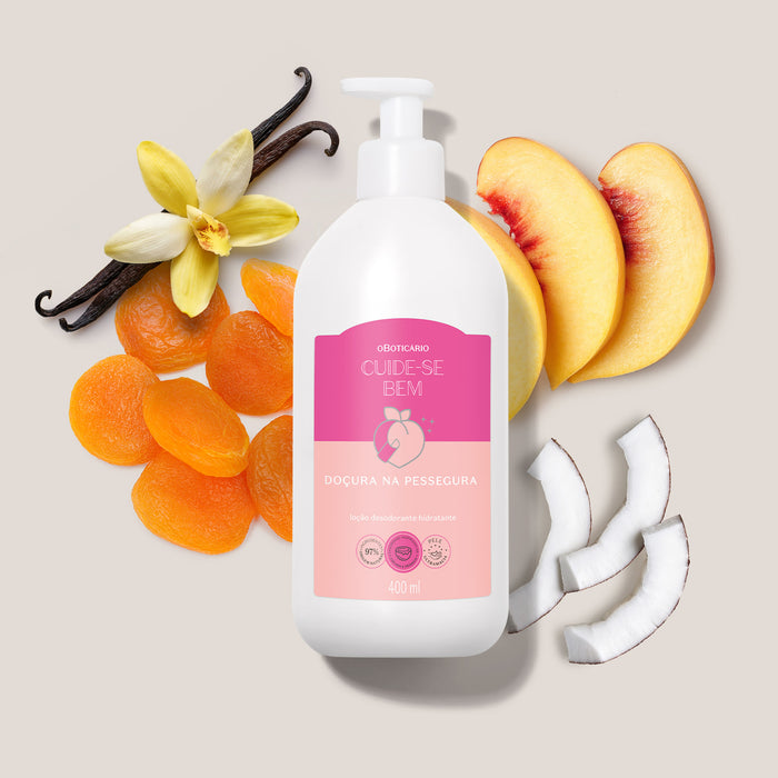 Boticário Cuide-se Bem Doçura na Pessegura body lotion 400 ml bottle styled with fresh peach slices, coconut pieces and vanilla pods showing the gourmand scent – Buy now at MKPBR.COM – Worldwide Shipping