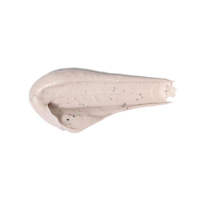 Swatch of Boticário Doçura na Pessegura body scrub showing the creamy peach-toned texture with coconut shell exfoliating particles – Buy now at MKPBR.COM – Worldwide Shipping
