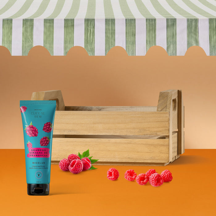 Lifestyle shot of Boticário Cuide-se Bem Feira Raspberry Vinegar Micellar Shampoo 230 ml styled with fresh raspberries, Brazilian cruelty-free hair care – Buy now at MKPBR.COM – Worldwide Shipping