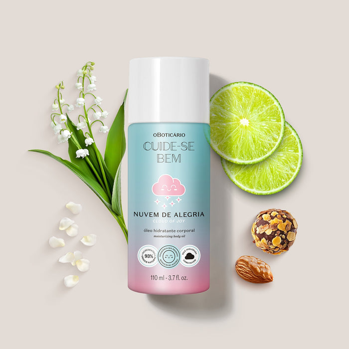 Boticario Cuide-se Bem Nuvem de Alegria body oil flat lay surrounded by lime slices, lily of the valley flowers and almonds representing the fruity citrus fragrance – Buy now at MKPBR.COM – Worldwide Shipping