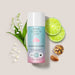 Boticario Cuide-se Bem Nuvem de Alegria body oil flat lay surrounded by lime slices, lily of the valley flowers and almonds representing the fruity citrus fragrance – Buy now at MKPBR.COM – Worldwide Shipping