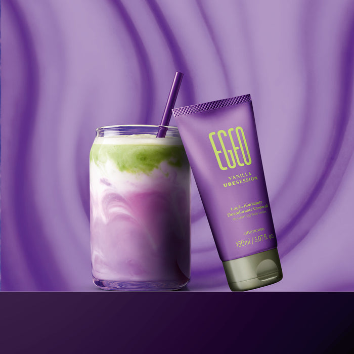 Egeo Vanilla Ubesession Brazilian body lotion tube leaning on a layered ube and matcha latte glass, showing the gourmand vanilla fragrance mood – Buy now at MKPBR.COM – Worldwide Shipping