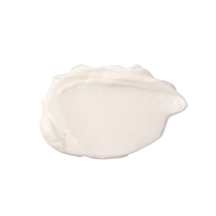 Swatch of the white, velvety Her Code moisturizing body cream by O Boticário on a plain white background – Buy now at MKPBR.COM – Worldwide Shipping