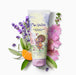 Boticário Ma Chérie Deodorant Body Lotion tube surrounded by lavender sprigs, a mandarin segment and pink mallow flowers illustrating the soft floral fragrance – Buy now at MKPBR.COM – Worldwide Shipping