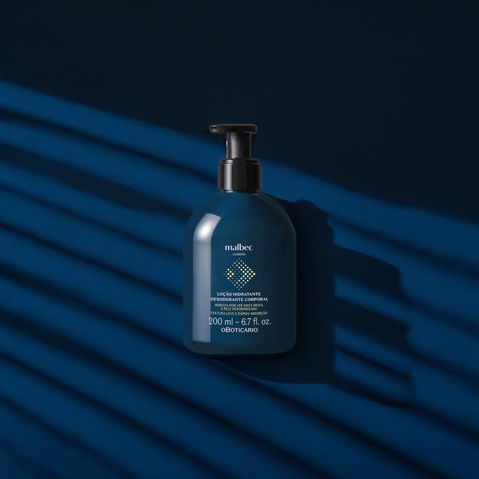 O Boticário Malbec Deodorant Body Lotion 200 ml bottle styled on a deep navy backdrop with shadow play, Brazilian grape seed body moisturizer for men – Buy now at MKPBR.COM – Worldwide Shipping