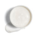 Close-up of the thick white cream texture of the Boticário Match Curvas Crespos styling cream for coily hair – Buy now at MKPBR.COM – Worldwide Shipping