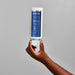 Creamy white texture of Boticário Match Escudo de Hidratação Conditioner swatched in the palm of a hand, showing its rich Shea Butter and Multi-Hyaluronic cream – Buy now at MKPBR.COM – Worldwide Shipping