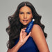 Detail panel of O Boticário Match Escudo de Hidratação leave-in spray highlighting heat protection, detangling and softness benefits – Buy now at MKPBR.COM – Worldwide Shipping