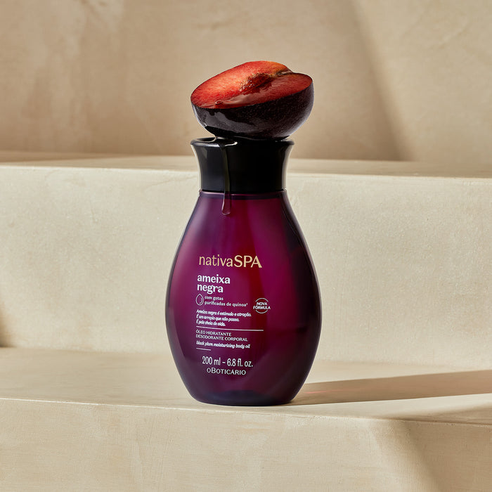 Lifestyle bathroom scene showing the Boticário Nativa SPA Ameixa Negra Hydrating Body Oil 200 ml bottle styled for an in-shower Brazilian spa ritual with black plum fragrance – Buy now at MKPBR.COM – Worldwide Shipping