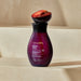 Lifestyle bathroom scene showing the Boticário Nativa SPA Ameixa Negra Hydrating Body Oil 200 ml bottle styled for an in-shower Brazilian spa ritual with black plum fragrance – Buy now at MKPBR.COM – Worldwide Shipping
