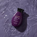 Boticário Nativa SPA Orquídea Noire body oil bottle resting in rippling water, illustrating its in-shower use with or without rinsing – Buy now at MKPBR.COM – Worldwide Shipping
