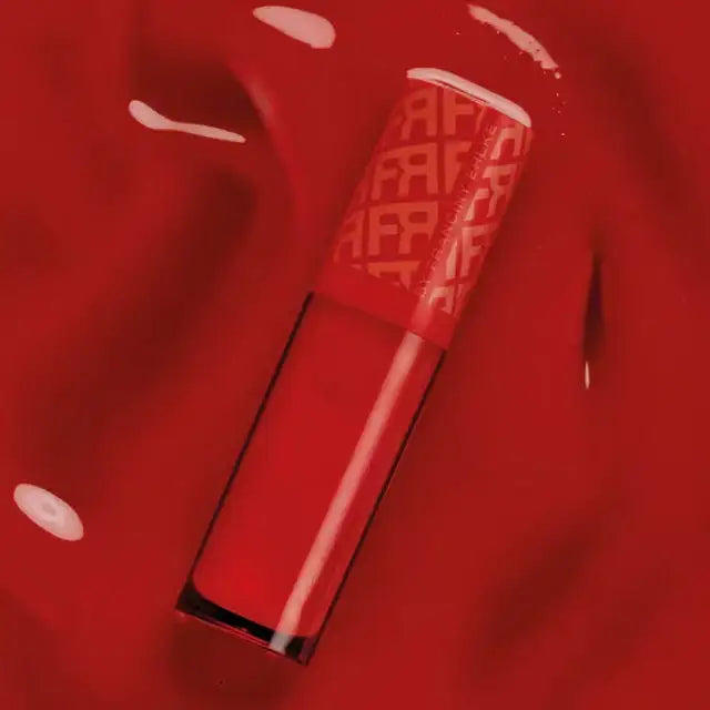 Close-up of Fran by Franciny Ehlke Glosslicious Cherry Lip Gloss, revealing its intense red color and glossy, luxurious texture – Buy now at MKPBR.COM – Worldwide Shipping