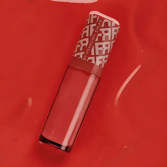 Detailed product shot of Fran by Franciny Ehlke Glosslicious Juicy Lip Gloss, emphasizing its smooth pink texture and vibrant color – Buy now at MKPBR.COM – Worldwide Shipping
