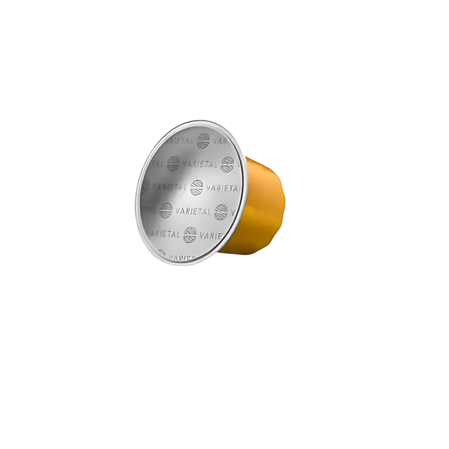 Orfeu Bourbon Amarelo Espresso Capsules – 100% Arabica, Medium-Light Roast – 10 Count, 1.76 oz (50g) – A single golden Orfeu Bourbon Amarelo capsule, perfectly highlighting its design and readiness for brewing, representing one of the 10 included. – Buy now at MKPBR.COM – Worldwide Shipping