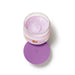 Top view of the opened Boticário Liz D'Essence body cream jar showing the swirled lilac-pink cream texture and purple lid – Buy now at MKPBR.COM – Worldwide Shipping