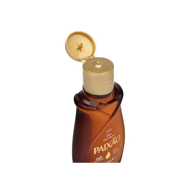 Open flip-top gold cap showing dispenser of Paixão Avelã Hazelnut body oil. Buy now at MKPBR.COM – Worldwide Shipping