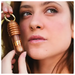 Model showcasing Fran by Franciny Ehlke Lip Honey Lip Gloss, highlighting its natural hydrating shine – Buy now at MKPBR.COM – Worldwide Shipping