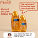 Muriel Almond & Argan Body Oil | Perfumed & Softening | 3.38 fl oz (100ml) - Product held in hand, conveying its ergonomic design and luxurious feel – Buy now at MKPBR.COM – Worldwide Shipping