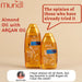 Muriel Almond & Argan Body Oil | Perfumed & Softening | 3.38 fl oz (100ml) - Product held in hand, conveying its ergonomic design and luxurious feel – Buy now at MKPBR.COM – Worldwide Shipping
