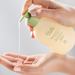 Natura Mamãe e Bebê Head‑to‑Toe Baby Wash + Refill Kit dispensing into hands – 2 x 6.76 fl oz (200 ml) – Buy now at MKPBR.COM – Worldwide Shipping