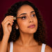 Niina Secrets Super Up Mascara woman applying lifestyle – Buy now at MKPBR.COM – Worldwide Shipping