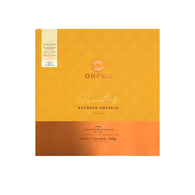 Orfeu Bourbon Amarelo Espresso Capsules – 100% Arabica, Medium-Light Roast – 3.53 oz (100g) – A close-up of the elegant Orfeu Bourbon Amarelo capsule box with loose golden capsules, highlighting its Nespresso®* compatibility and premium aesthetic. – Buy now at MKPBR.COM – Worldwide Shipping