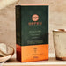 Orfeu Classic Ground Coffee – 100% Arabica, Floral, Fruity & Caramel Notes, Medium Roast – 8.82 oz (250g) – A styled flat lay featuring the Orfeu Classic Ground Coffee package, a cup of coffee, and small pastries for a perfect pairing. – Buy now at MKPBR.COM – Worldwide Shipping