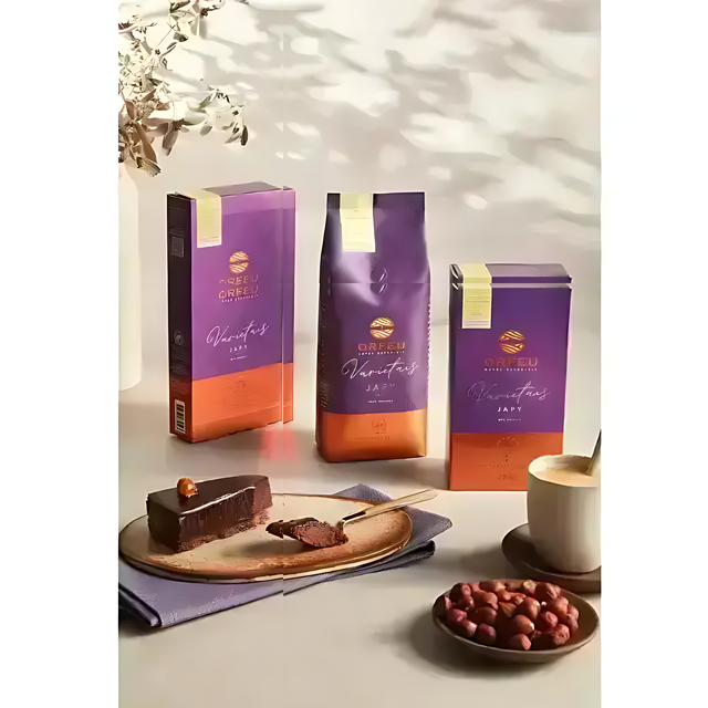 Orfeu JapyCoffee Line– 8.82 oz (250g) – A lifestyle flat lay featuring the Orfeu Japy Whole Bean Coffee package, a brewed cup, and dark chocolate cake, creating an inviting scene. – Buy now at MKPBR.COM – Worldwide Shipping