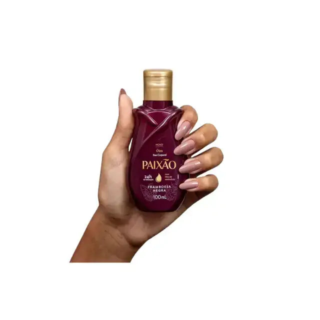 Paixão Black Raspberry deodorant body oil in hand for size reference. Buy now at MKPBR.COM – Worldwide Shipping