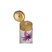 Close-up of Paixão Irresistível Flor de Lis body lotion golden flip-top cap open, highlighting convenient dispenser and premium packaging. Buy now at MKPBR.COM – Worldwide Shipping