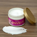  Paixão Flor de Baunilha body lotion 300g, open jar with gold lid and creamy texture smeared on wood, vanilla flower scent with almond oil for silky hydration. Buy now at MKPBR.COM – Worldwide Shipping