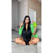 Model with long black straight hair sitting on sofa holding Gold Spell Receitinha Poderosa hair tonic 250ml - Buy now at MKPBR.COM - Worldwide Shipping