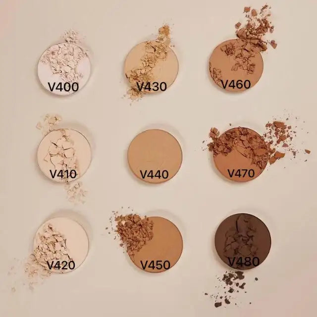 Nine individual circular crushed powder swatches of Vult Ultrafine Matte Compact Powder for shades V400, V410, V420, V430, V440, V450, V460, V470, and V480, showcasing diverse complexion options for a perfect match – Buy now at MKPBR.COM – Worldwide Shipping