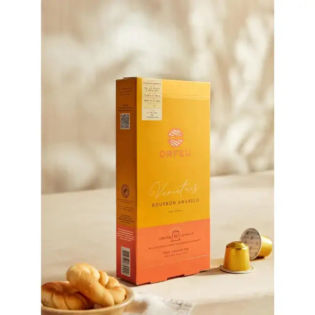 Orfeu Bourbon Amarelo Espresso Capsules – 100% Arabica, Medium-Light Roast – 10 Count, 1.76 oz (50g) – An inviting scene of 10-count Orfeu Bourbon Amarelo packaging, suggesting a calming wellness moment. – Buy now at MKPBR.COM – Worldwide Shipping